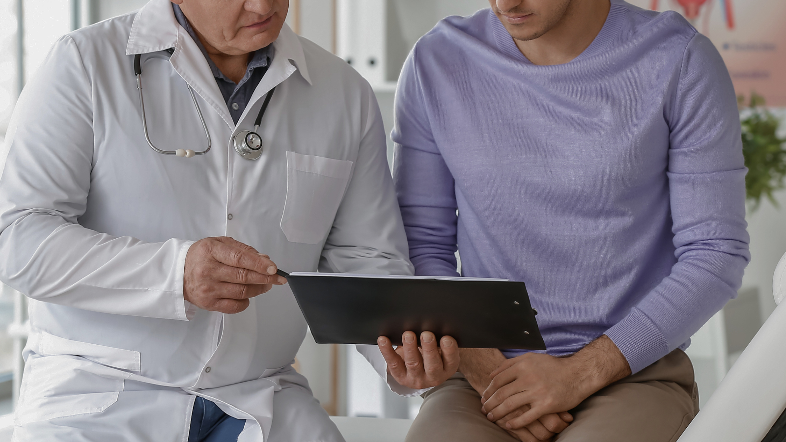 A man consults a doctor about erectile dysfunction