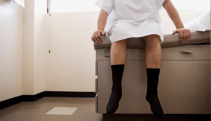 Man sitting on an exam table