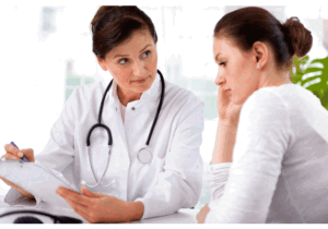 A provider talks to a patient