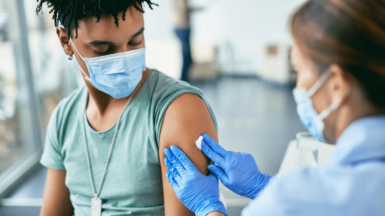 Young man getting vaccine
