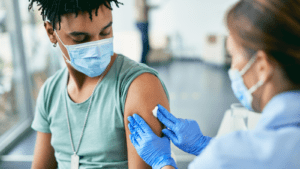 Young man getting vaccine