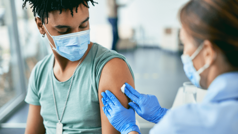 Young man getting vaccine