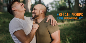 Two men embracing and laughing