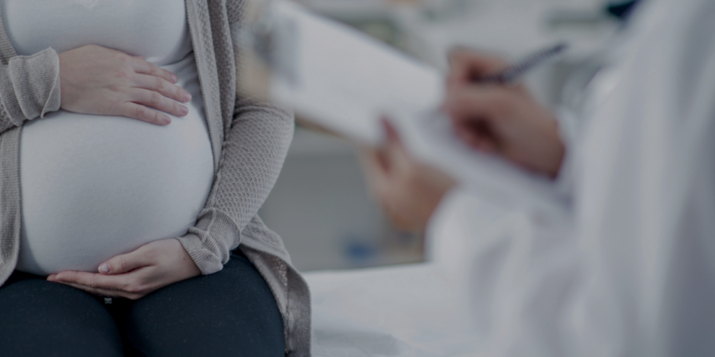 A pregnant patient at a doctor's appointment
