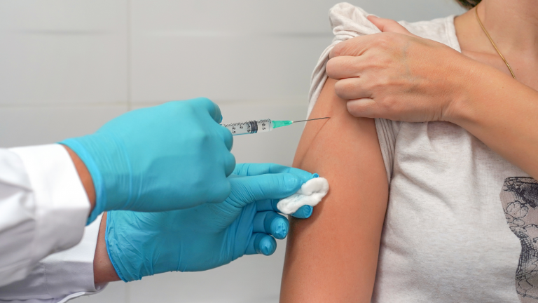 A woman gets an injection
