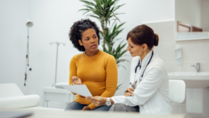 A woman talks with her health care provider about the link between BV and chlamydia