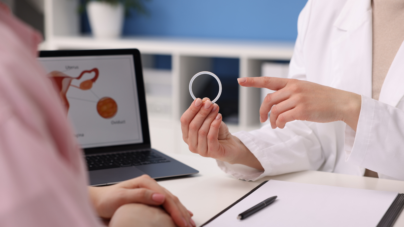 A health care provider holds a contraceptive ring