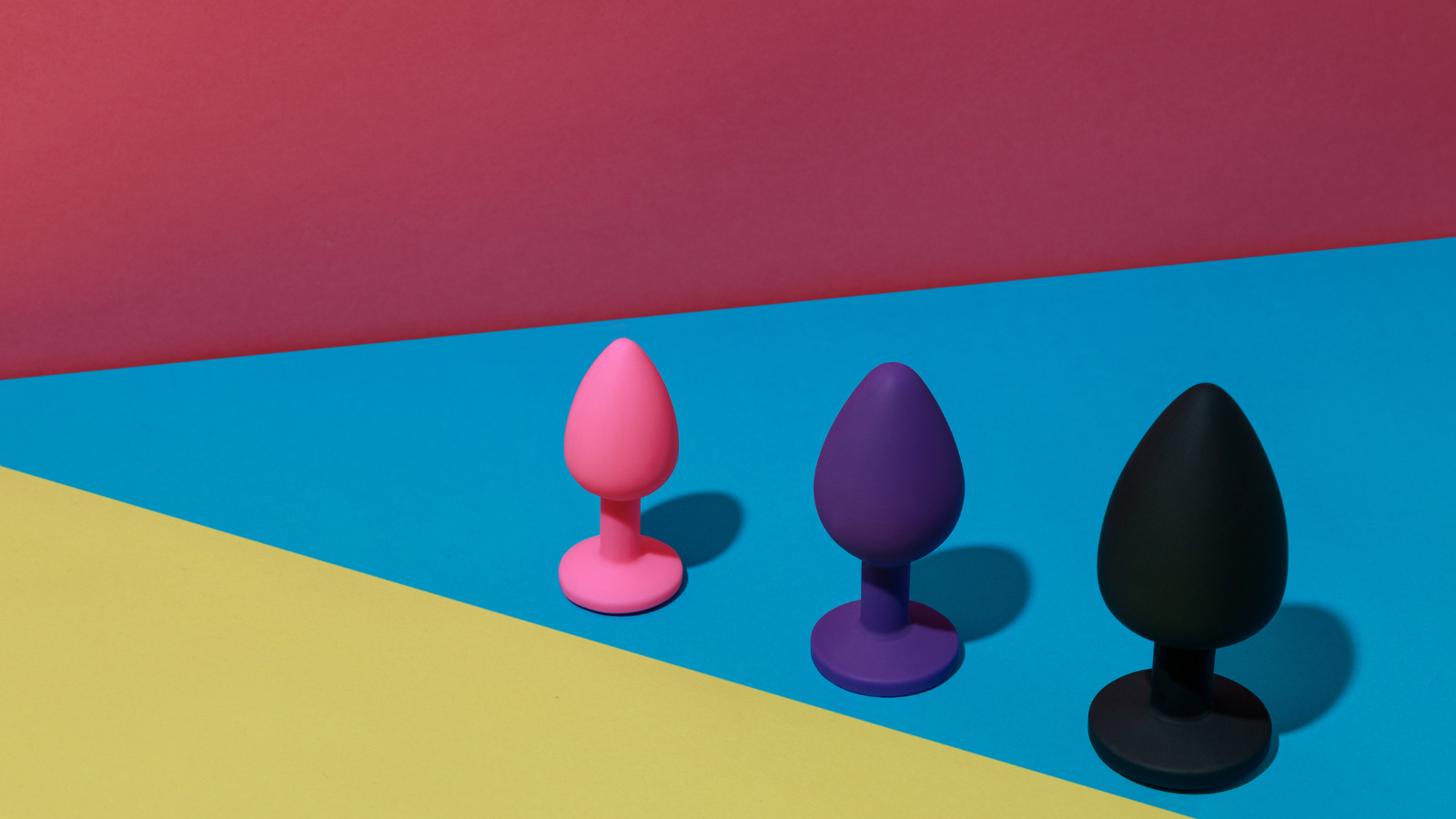 Three butt plugs used for anal play or anal sex