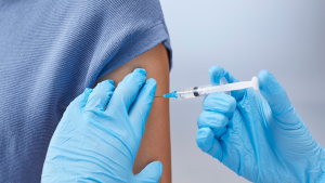 A person receives a vaccine