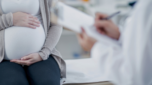 A pregnant patient at a doctor's appointment