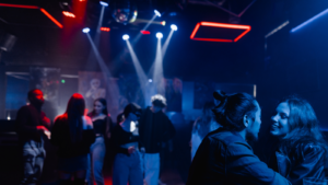 A couple flirting at a nightclub